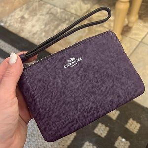 Purple leather coach wristlet